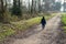 Toddler walking alone on a desolate country road