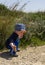 Toddler wearing a hat at nature reserve