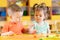 Toddlers boy and girl playing at table with educational toys. Children infants at home or daycare.