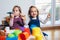 Toddlers girls play toys at home, kindergarten or nursery