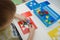 Toddlers playing multicolored educational games, mosaic and puzzles table