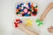 Toddlers playing multicolored educational games, mosaic and puzzles table