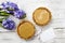 Toffee tarts on wooden table