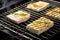 tofu steaks on a stainless steel grill rack