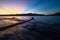 Togean Islands Sunset, Togian Islands travel destination, Sulawesi, Indonesia. Sailing by traditional boat, stunning colorful sky,