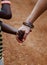 Together for Africa: Holding Hands between poor African child and white caucasian Woman