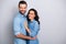 Together forever. Portrait of handsome charming married people spouses isolated feeling cheerful joyful wearing denim