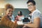 Together, well achieve excellence. Portrait of two young designers sitting in an office.