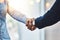 Together well become unstoppable. Closeup shot of two unrecognizable businesspeople shaking hands in an office.