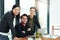 Together were a force to be reckoned with. Cropped portrait of a team of businesspeople discussing work at a desk in