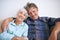 Together weve made it through a lot. Portrait of an affectionate senior couple sitting together in their home.