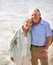 Together wherever life leads them. Portrait of an elderly couple on the beach.