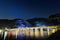 Togetsu Bridge reflecting in the Katsura River at night during the December illumination festival in the Arashiyama area of Kyoto