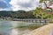 Togetsukyo Bridge with Tourists near Hozu River in Autumn, Arashiyama, Kyoto, Japan