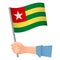 Togo flag in hand