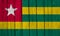 Togo Flag Over Wood Planks