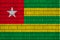 Togo flag painted on a brick wall