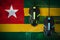 Togo flag and two mice with backlight. Online cooperative games. Cyber sport team