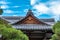 The Togudo Hall with blue sky and green trees in the Ginkaku-ji temple complex in Kyoto