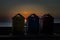 Toilet cabins at the beach in Vinaros, Castellon, Spain at sunset