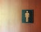 Toilet male signs on the wooden door