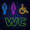 Toilet neon sign. Glowing neon inscription with man, woman and wheelchair figures on dark blue brick background. Can be used for