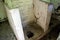 Toilet in the old abandoned house in Ukraine