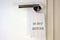 Toilet/restroom door with decorative wooden do not disturb sign