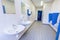 Toilet room for men with urinals sinks and mirrors