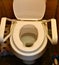 Toilet seat open for disabled people