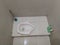 A Toilet Sets in Indonesia considted of White Ceramic Squat Toilet and Brush