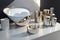 Toiletry and Cosmetic Containers in Silver and Gold Metallic Colors