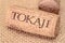 TOKAI, HUNGARY - FEBRUARY 07, 2019: Wine cork of Tokaji wine on burlap background