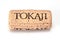 TOKAI, HUNGARY - FEBRUARY 07, 2019: Wine cork of Tokaji wine isolated on white background. Tokai, Hungary