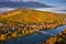 Tokaj, Hungary - Aerial panoramic view of the small town of Tokaj with golden vineyards on the hills of wine region at autumn