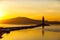 Tokarevsky lighthouse during a colorful dawn against the backdrop of a beautiful sea.