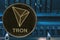 Token cryptocurrency Tron TRX against the numbers of the arithmometer.