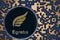 Token egt egretia coin cryptocurrency on the background of gold crypto code