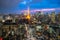 Tokyo city skyline view and office business building skyscraper downtown center with Tokyo Tower at evening in Japan. Asia tourism