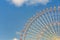 Tokyo giant ferris wheel against blue sky