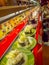 TOKYO, JAPAN -28 JUN 2017: Close up of assorted japanesse food over a table, inside of a kaitenzushi conveyor belt sushi