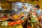 TOKYO, JAPAN -28 JUN 2017: Unidentified people eating an assorted japanesse food over a table, inside of a kaitenzushi