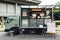 Tokyo, Japan - December 20, 2020 : two asian chefs preparing pizza for sell on the japanese food truck in the park at Tokyo