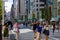 TOKYO, JAPAN - JULY 30 2023: Shoppers on the closed roads of Ginza, the luxury retail district of central Tokyo