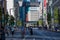 TOKYO, JAPAN - JULY 30 2023: Shoppers on the closed roads of Ginza, the luxury retail district of central Tokyo