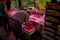 TOKYO, JAPAN JUNE 28 - 2017: Unidentified people selling and buying seafood packed inside of plastic boxes at Fish