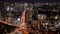 Tokyo, Japan- November 6, 2019: 4K time lapse video of Birdseye view of minato main roads under Tokyo tower in the city traffic