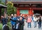 TOKYO, JAPAN - NOVEMBER 7, 2017: A stylish man does selfie in the background of a crowd.