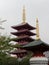 TOKYO, JAPAN - SEPTEMBER 28, 2017: Famous 5 storied pagoda in Senso-ji temple with a small pagoda in the foreground