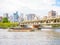 TOKYO, JAPAN - SEPTEMBER 8, 2018. Cruise boat sailing along Sumida River in a hot summer day.